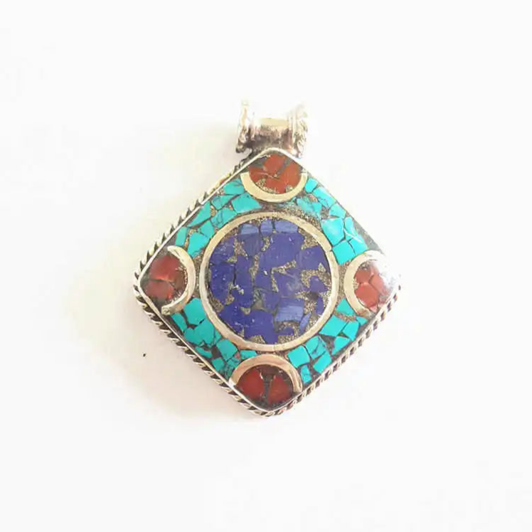 Nepalese charm on white Indian copper